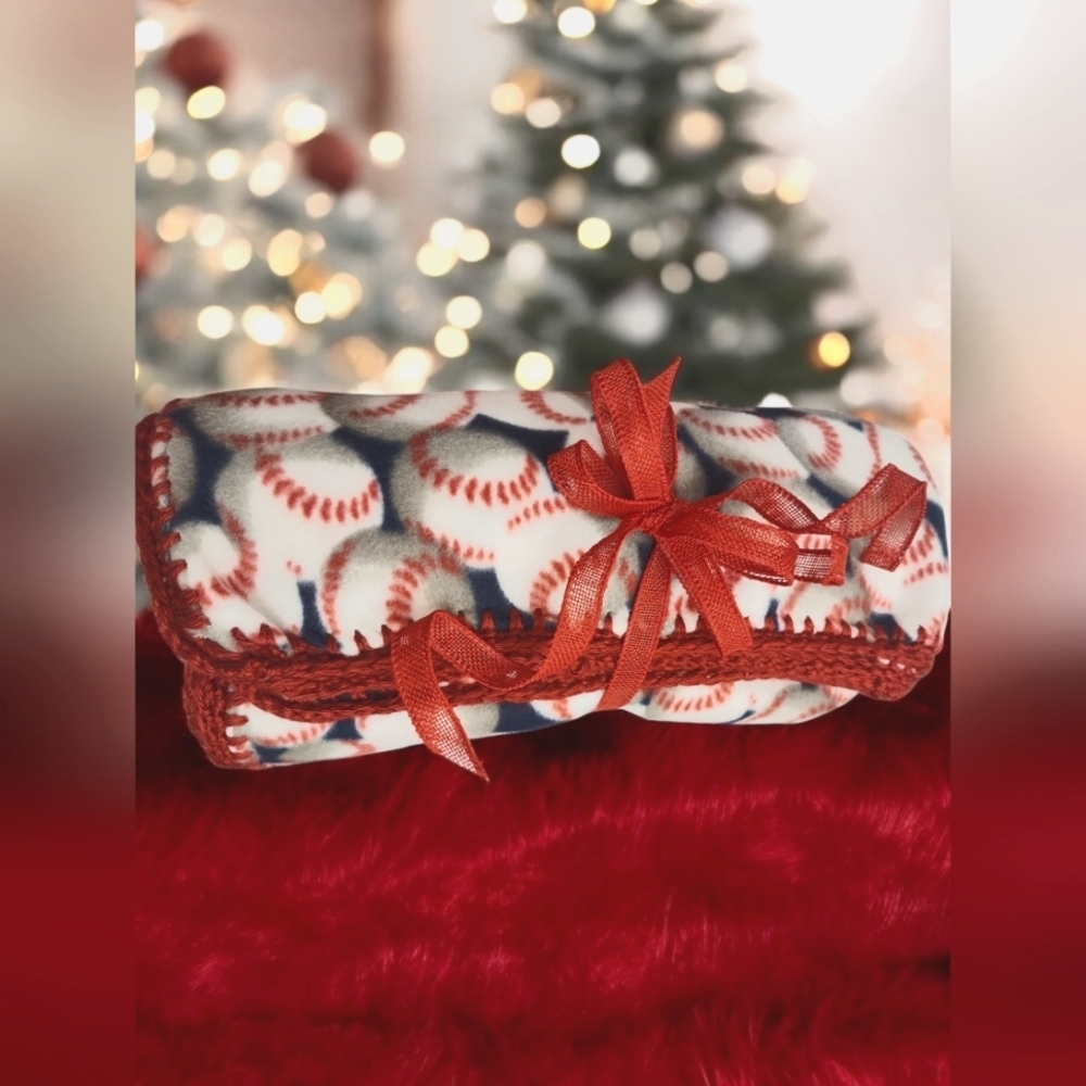 Handmade fleece child's blanket with crochet-edging